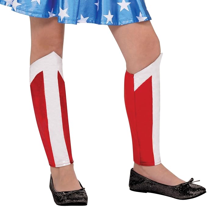 Red and white boot warmers worn over black glitter flats with the star-print skirt hem.